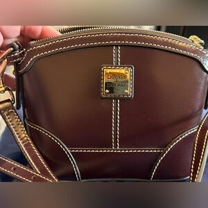 Dooney & Bourke mini domed crossbody. Brand new without tags